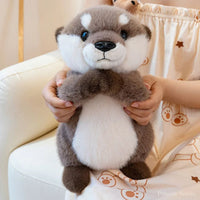 peluche-loutre-main-priere
