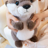 peluche-loutre-blanche-marron