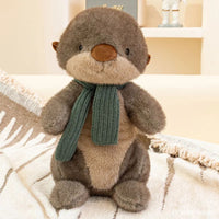 peluche-loutre-echarpe-verte