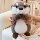 peluche-loutre-main-priere